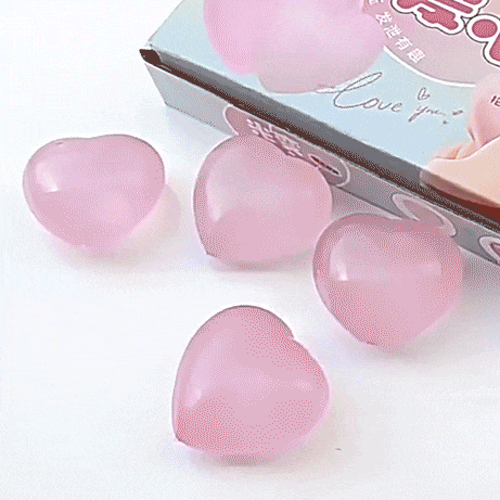 Jouet anti-stress à rebond lent en forme de cœur qui change de couleur